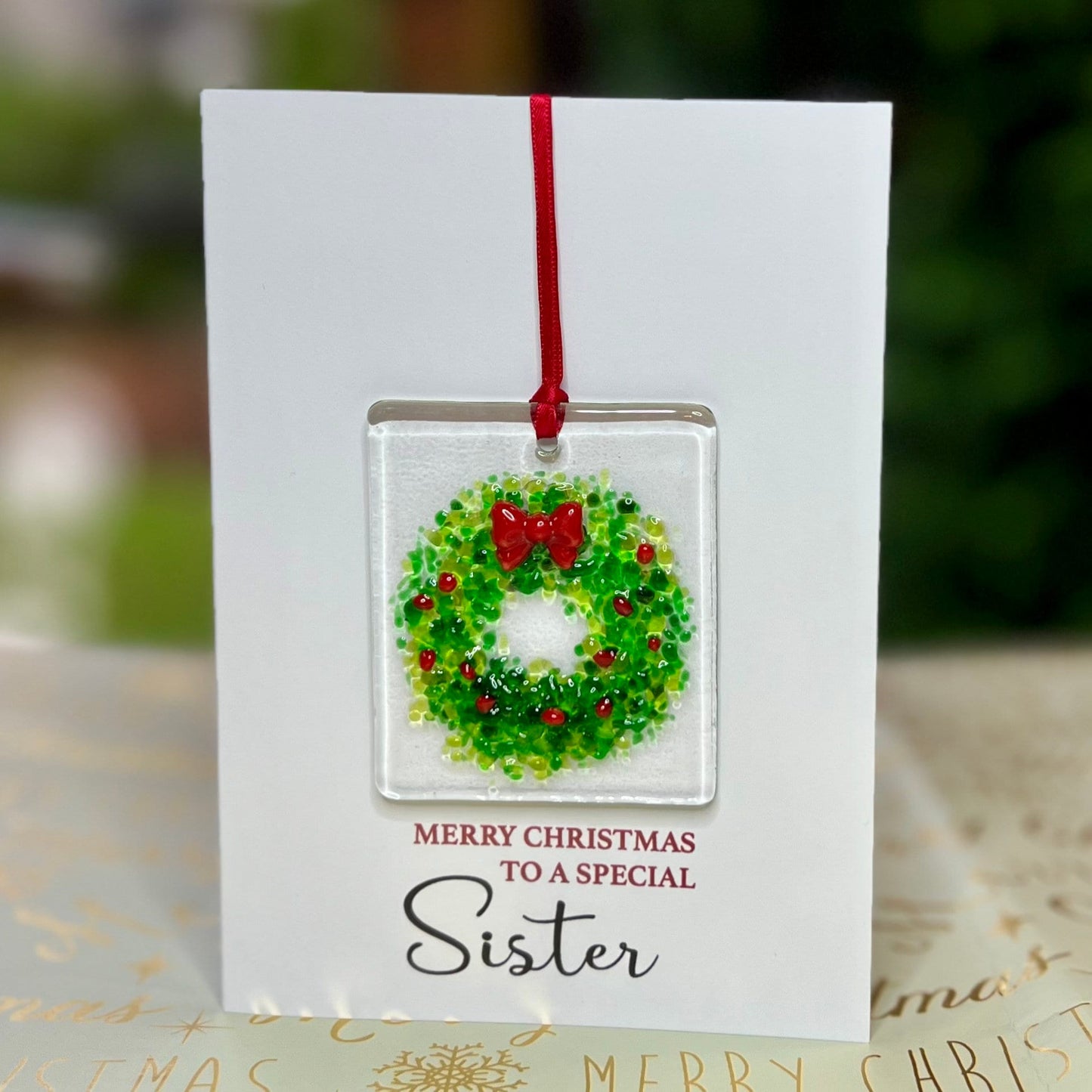 Merry Christmas Sister card with detachable handmade glass holly wreath decoration