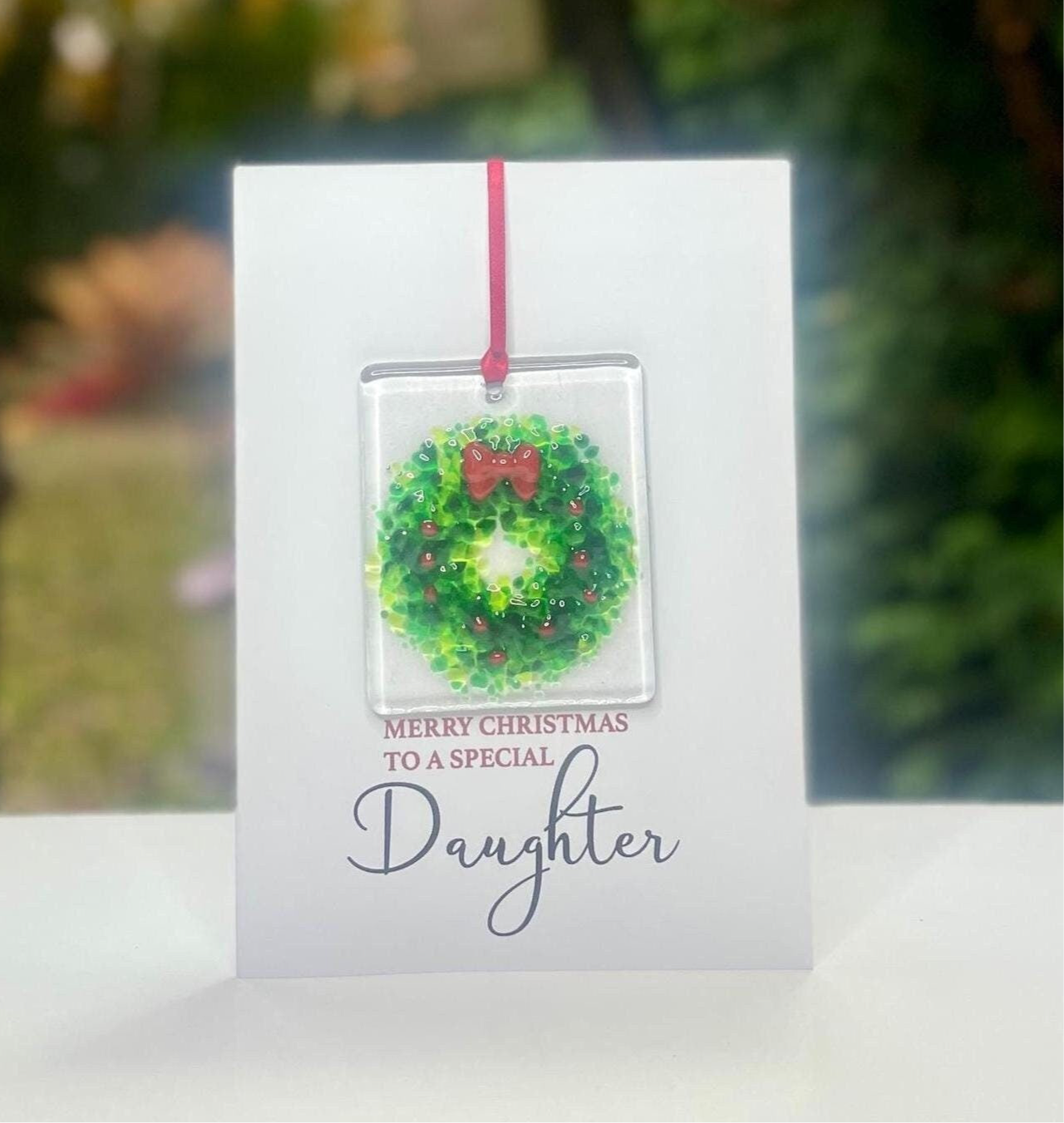 Merry Christmas Daughter card with detachable handmade glass holly wreath decoration
