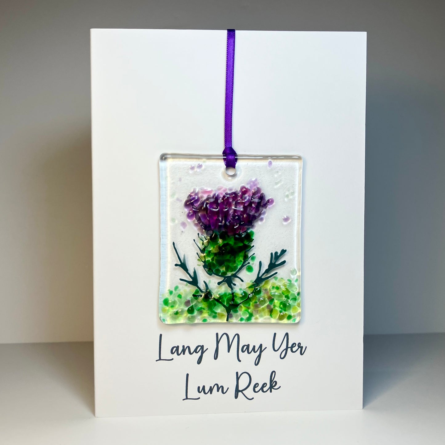 Lang may yer Lum Reek card with detachable handmade fused glass thistle keepsake